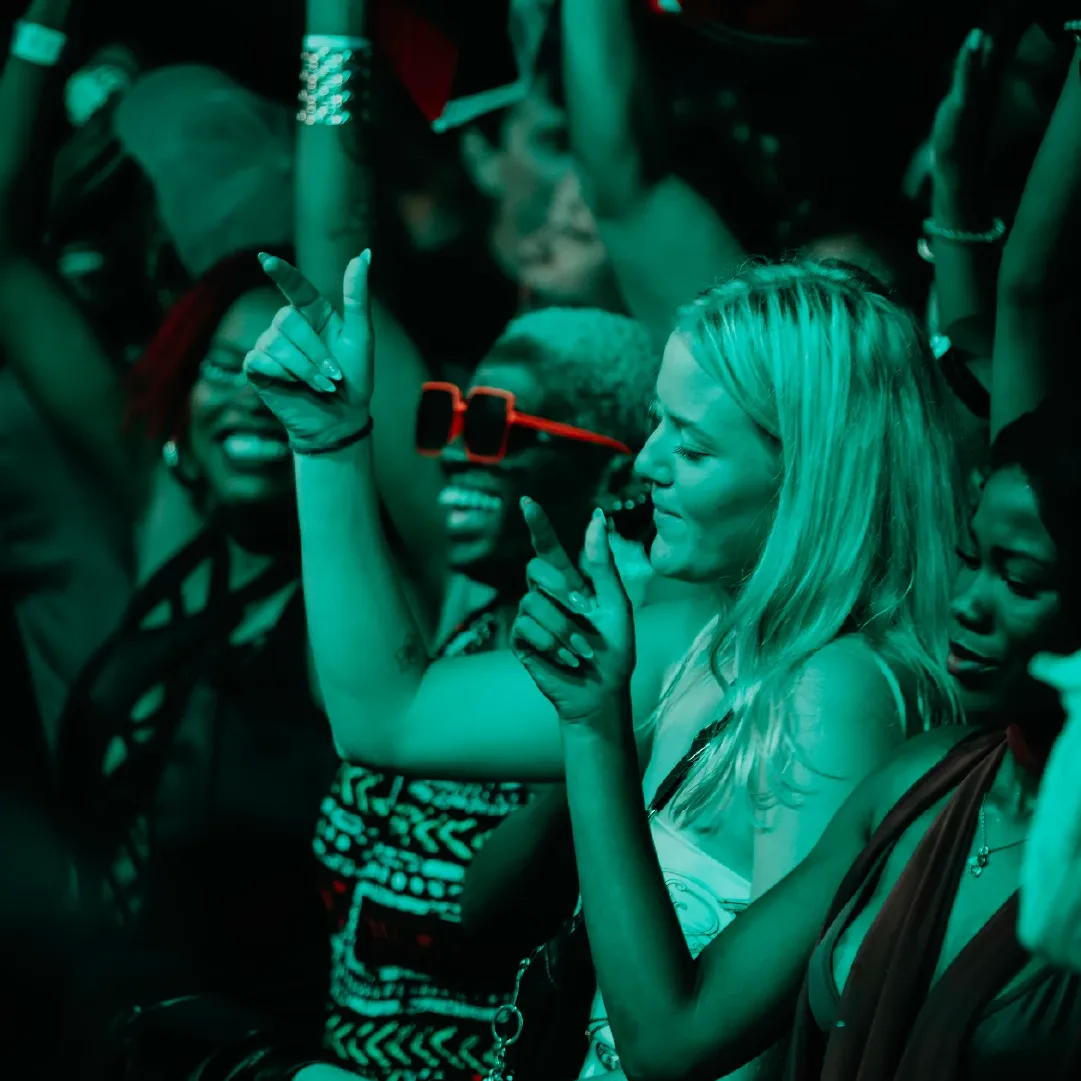 A photograph of some festival goers at Anjunadeep