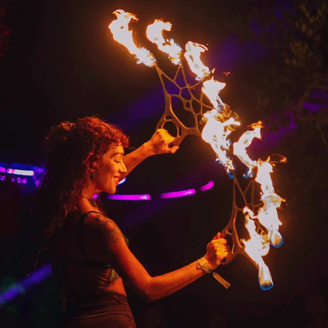 A photograph of a firedancer at Retreat Yourself
