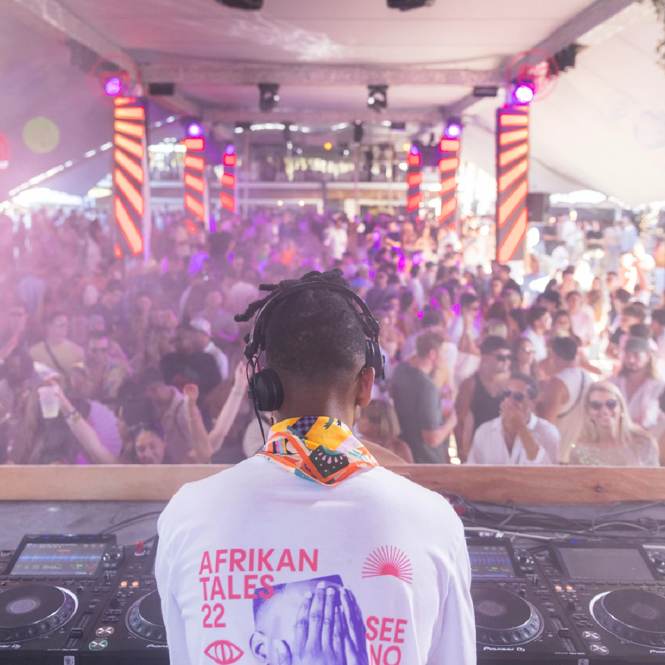 A photo from behind the DJ during the day at a Sexy Groovy Love party.